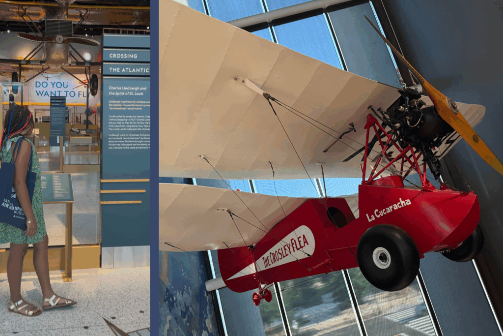 Liv looking at the story of the Spirit of St. Louis and a photo of the Crosby Flea air craft