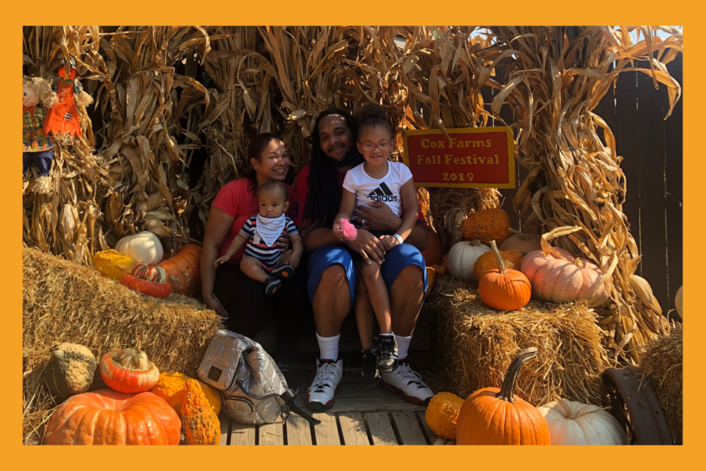 Siblings enjoying a family outing at Cox Farms Fall Festival in Centreville, Virginia, in 2019.