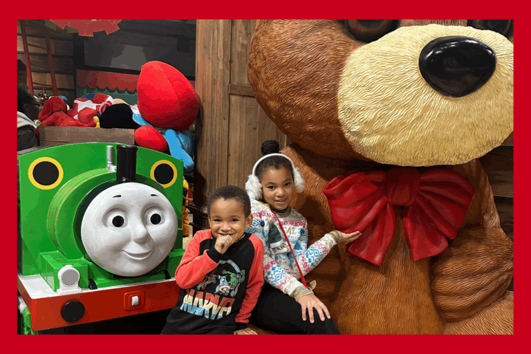Jack and Liv pose in Santa's Workshop at Kings Dominion