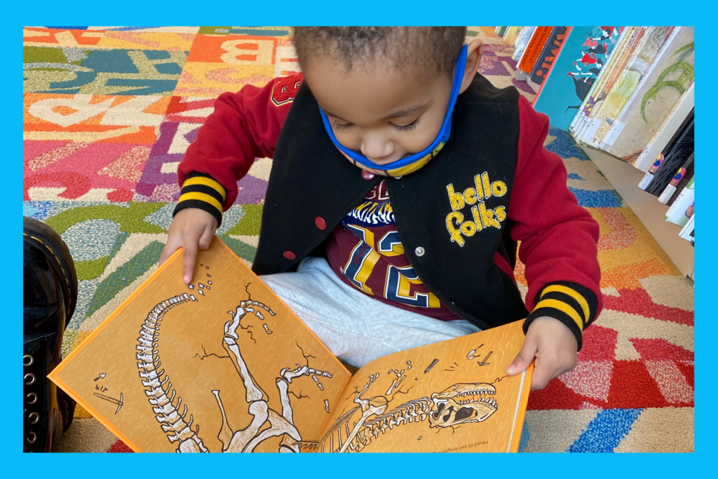 Jack read a book about dinosaurs at the library