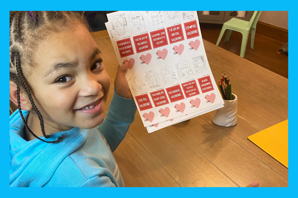 Liv holds homemade Valentine's Day cards