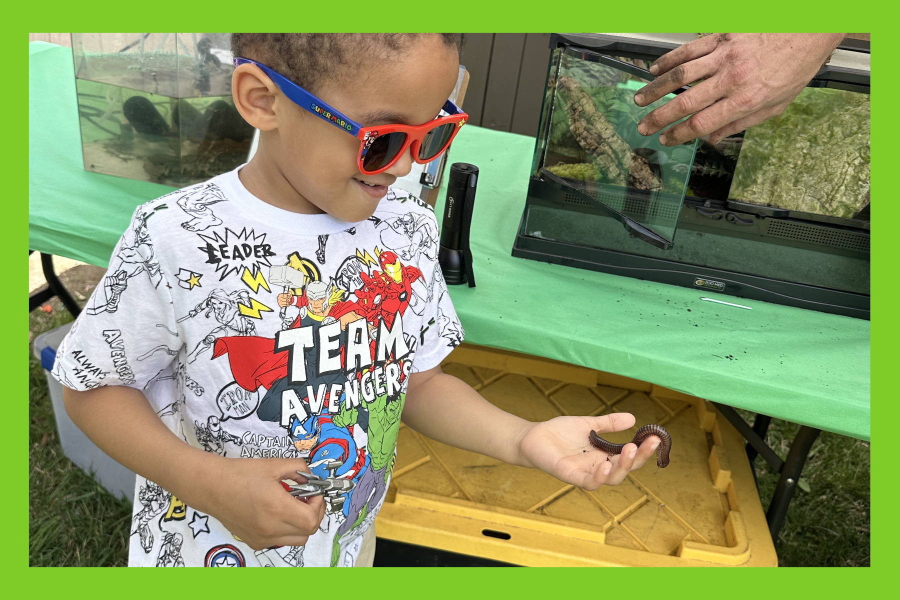 Jack handles a worm at Anacostia Park