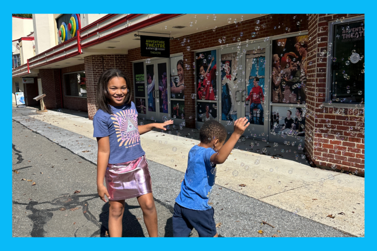 Playing with bubbles outside of adventure theatre in Bethesda, MD