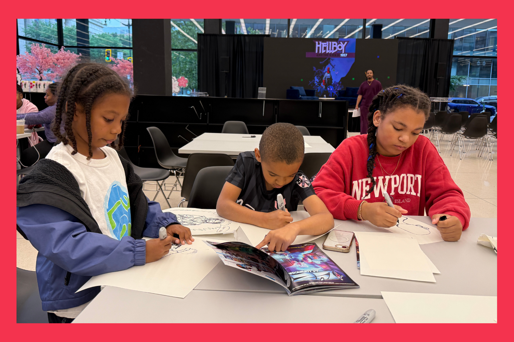 kids creating comic characters at the MLK Memorial Library