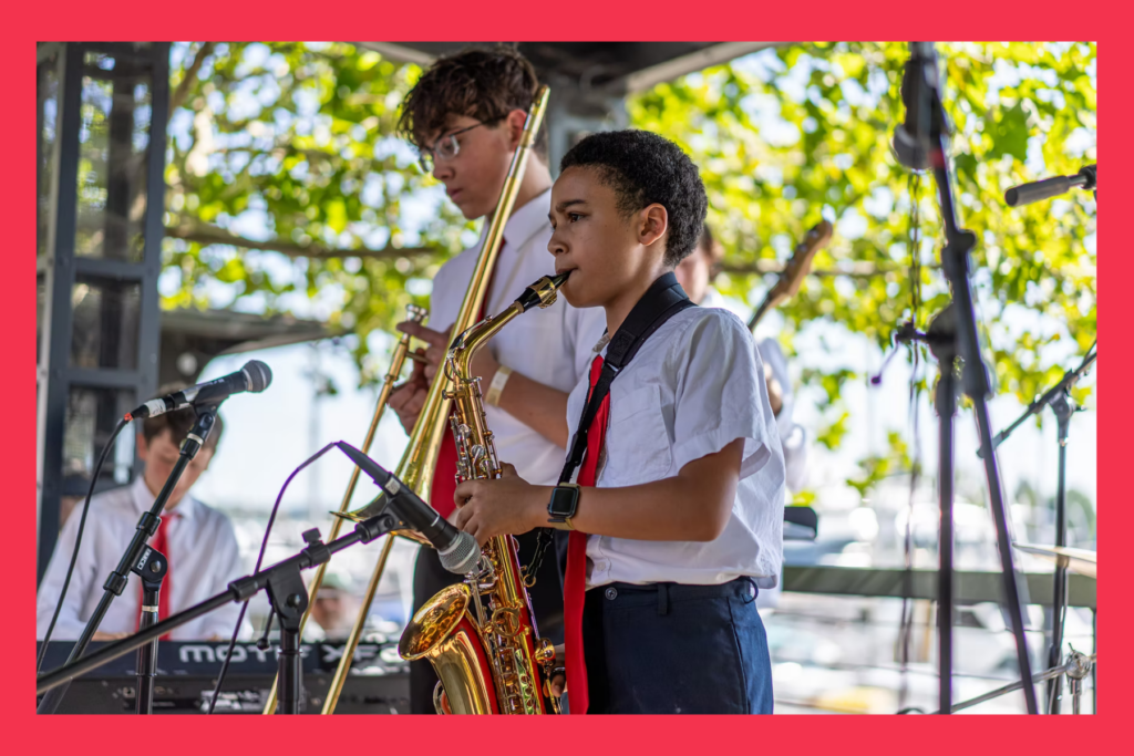 DC Jazz Fest youth saxophone players on stage.